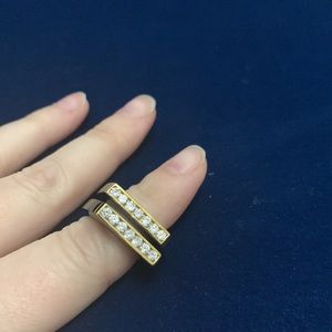 Gold and crystal rings black plastic rings